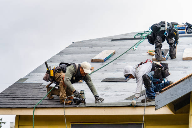 Professional Roofing technician working in Vestal, NY